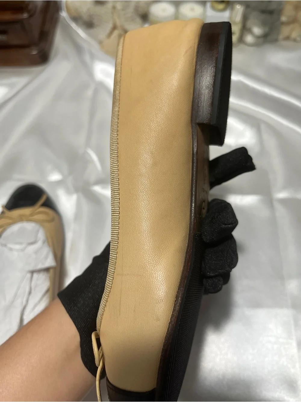 CHANEL Two-Tone Beige and Black Leather Ballet Flats with Bow